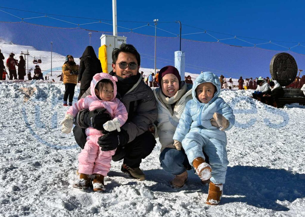family of four in snowsuits mt erciyes turkey